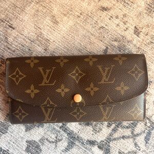 Louis Vuitton Emilie wallet Saffron